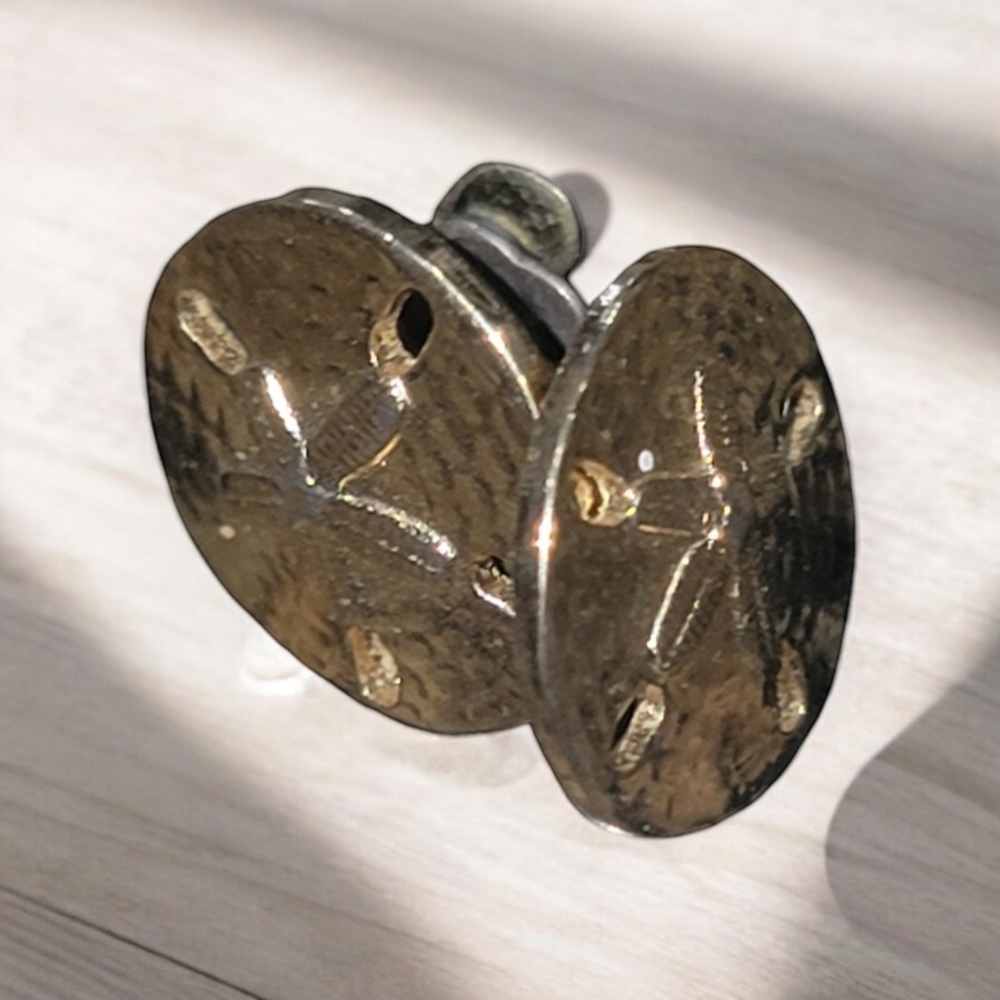 Pair of copper sand dollar earrings
